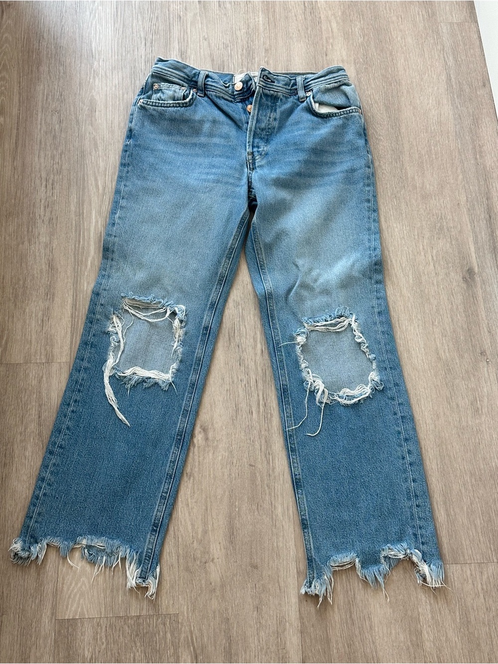 Free people blue wash ripped jeans - women’s 25